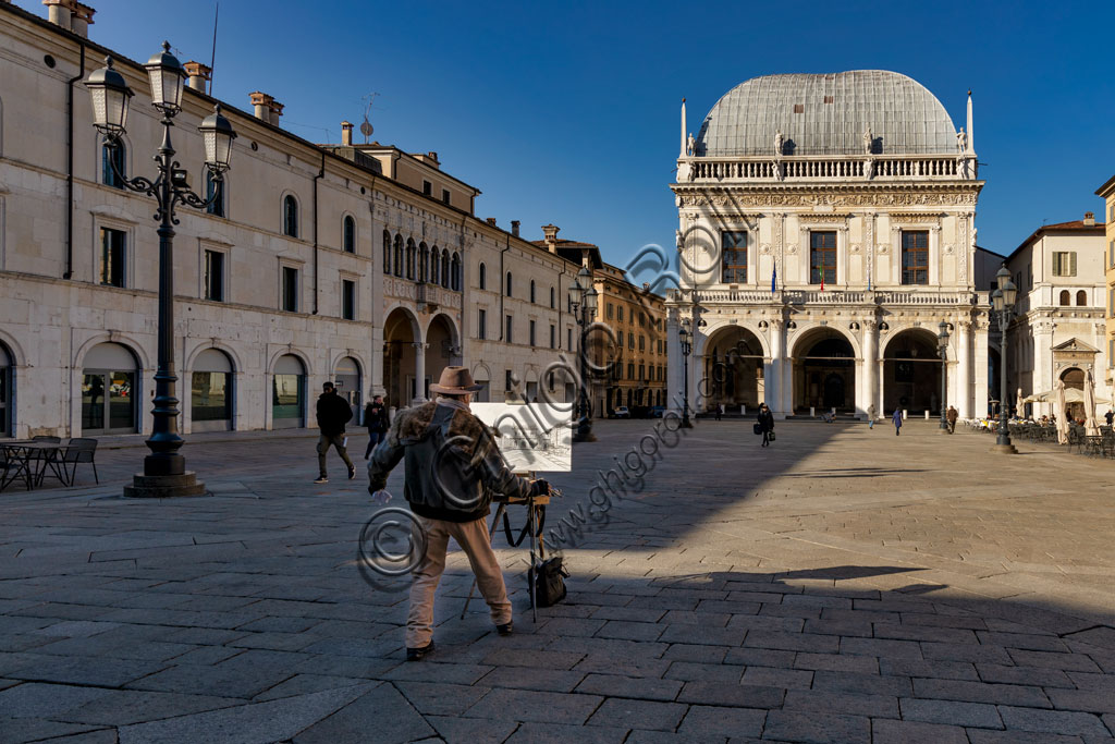 Brescia, piazza della Loggia (piazza rinascimentale di impronta veneziana): pittore ritrae il Palazzo della Loggia.