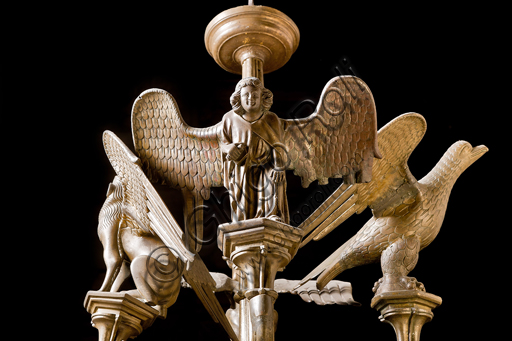 , Genoa, Duomo (St. Lawrence Cathedral), inside, presbitery: "Candlestick with symbols of the Evangelists", by Dinant Manufacture, about mid XV century.Detail.