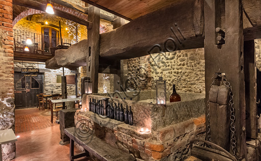 Candelo, Ricetto (fortified structure) Restaurant Il Torchio 1763:  the room with the ancient winepress.