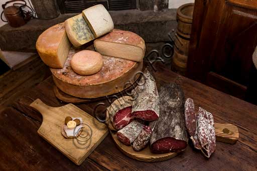   Gressoney La Trinité, Restaurant "La Capanna di Carla":  some typical products from Aosta Valley such as cheese, butter, cold cuts and chestnuts.