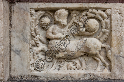 , Genoa, Duomo (St. Lawrence Cathedral), West side, the façade, the left doorway: "Centaur archer", figured panel of the base decoration.