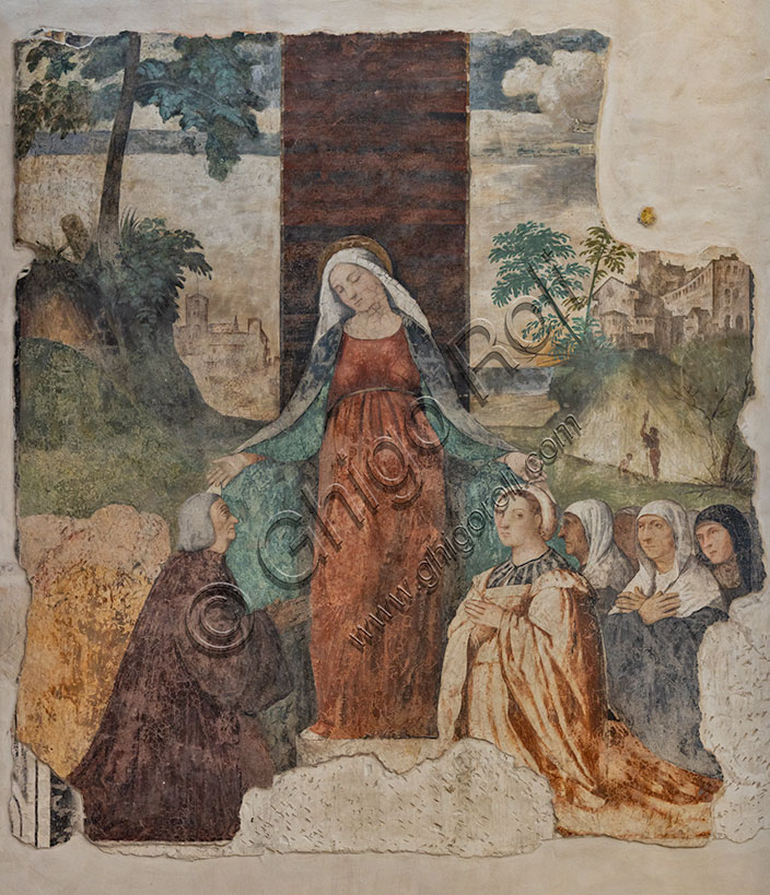 Chiesa di Santa Corona, contro acciata:  “Madonna della Misericordia e Beato Isnardo da Chiampo”, affresco attribuito ad Alessandro Verla, 1519.