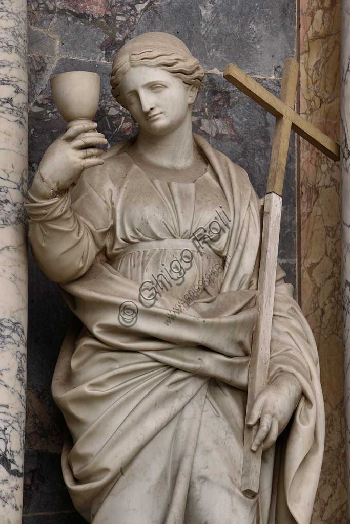 Church of Santa Croce, Mausoleum of St. Pius V: statue representing the Charity. Based on a design by Giovanni Antonio Buzzi (1568-1571).