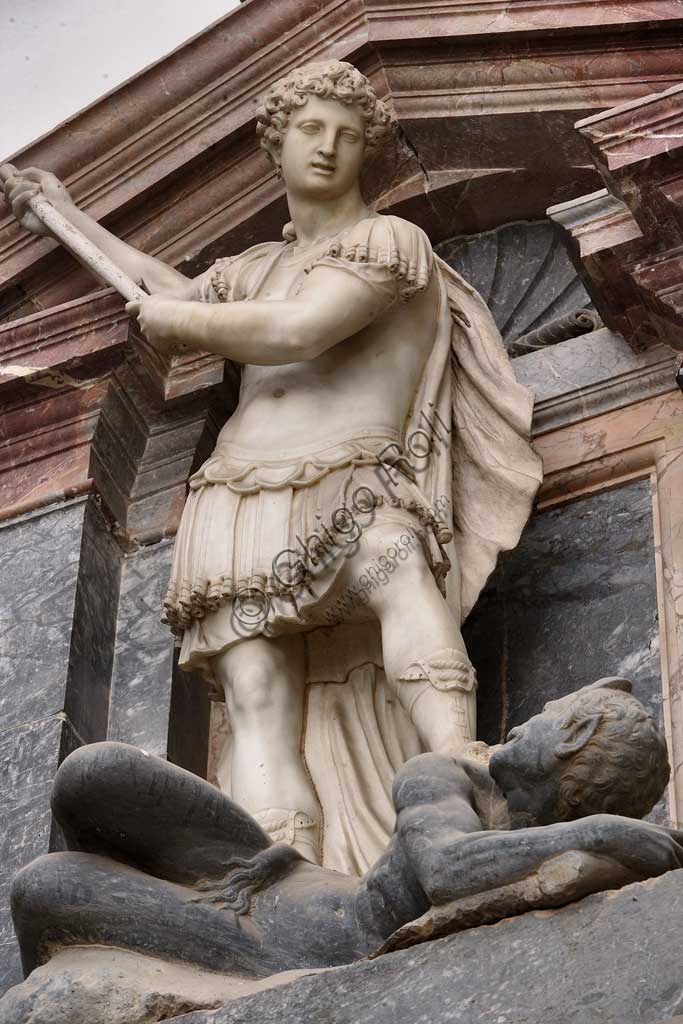 Church of Santa Croce, Mausoleum of St. Pius V: statue of St. Michael defeating the devil. Based on a design by Giovanni Antonio Buzzi (1568-1571).