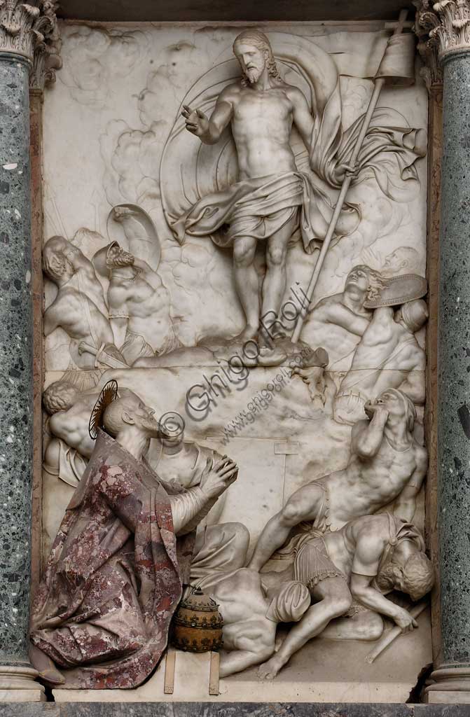 Church of Santa Croce, Mausoleum of St. Pius V: a high-relief in white marble representing  the Resurrection and Pius V in prayer. Based on a design by Giovanni Antonio Buzzi (1568-1571).