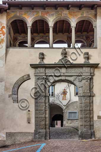  Clusone, Palazzo Comunale (Town Hall), built in the XI and XII century), Eastern Façade: stone portal and a small loggia with frescoes (XVI century).