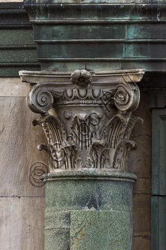 Florence, the Baptistery of St. John, exterior, the Northern façade in Carrara white marble and green Prato marble: detail of a column with capital.