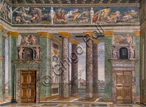 Rome, Villa Farnesina: The Hall of Perspectives, representing views of Rome. Frescoes by Baldassarre Peruzzi (1518-9). Detail with columns. It represents the ideal continuation of the ground floor loggias; through the imitation columns one can see various views: villages perched on rock, countryside views, and in the background, against an illuminated sky, is the city (The Holy Spirit Church, a Roman basilica, the porta Settimiana).