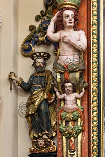  Bormio, Collegiate Church of SS. Gervasio and Protasio: detail of a wooden cornice in a side chapel.