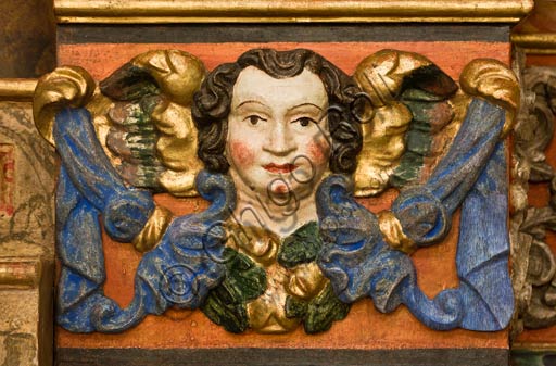  Bormio, Collegiate Church of SS. Gervasio and Protasio: detail of a wooden cornice in a side chapel.