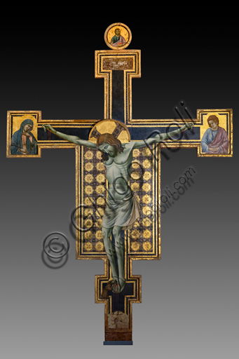 Montefalco, Complesso Museale di San Francesco: "Cristo crocifisso" (crocifisso d'altare), di maestro espressionista di Santa Chiara. Nella cimasa, il Redentore, ai lati la Vergine e S. Giovanni. Ai piedi della croce S. Francesco d'Assisi. Tempera su tavola, inizio XIV secolo. Influenza di Giotto.