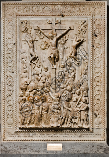 , Genoa, Duomo (St. Lawrence Cathedral), inside, the Southern aisle, southern wall: "Crucifixion" (1443) from the funerary monument of Girolamo Calvi, by Lombard artist of the Gagini workshop.