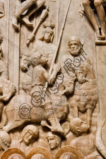 , Genoa, Duomo (St. Lawrence Cathedral), inside, the Southern aisle, southern wall: "Crucifixion" (1443) from the funerary monument of Girolamo Calvi, by Lombard artist of the Gagini workshop.Detail of a man riding a horse.