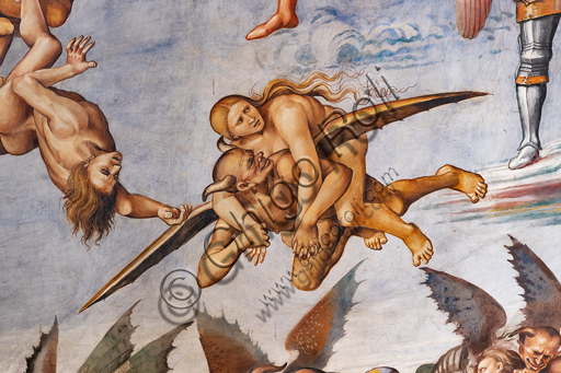  Orvieto,  Basilica Cathedral of Santa Maria Assunta (or Duomo), the interior, Chapel Nova or St. Brizio Chapel, the lunette of the east wall: "Damned to hell", fresco by Luca Signorelli, (1500 - 1502). Detail of the flying demon that carries a prosperous sinner on his shoulders  and looks back towards her grinning, evidently satisfied with the prey.