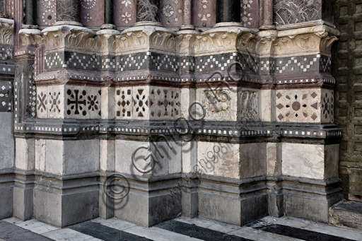 , Genoa, Duomo (St. Lawrence Cathedral), West side, the façade, the left doorway: details of the bases.