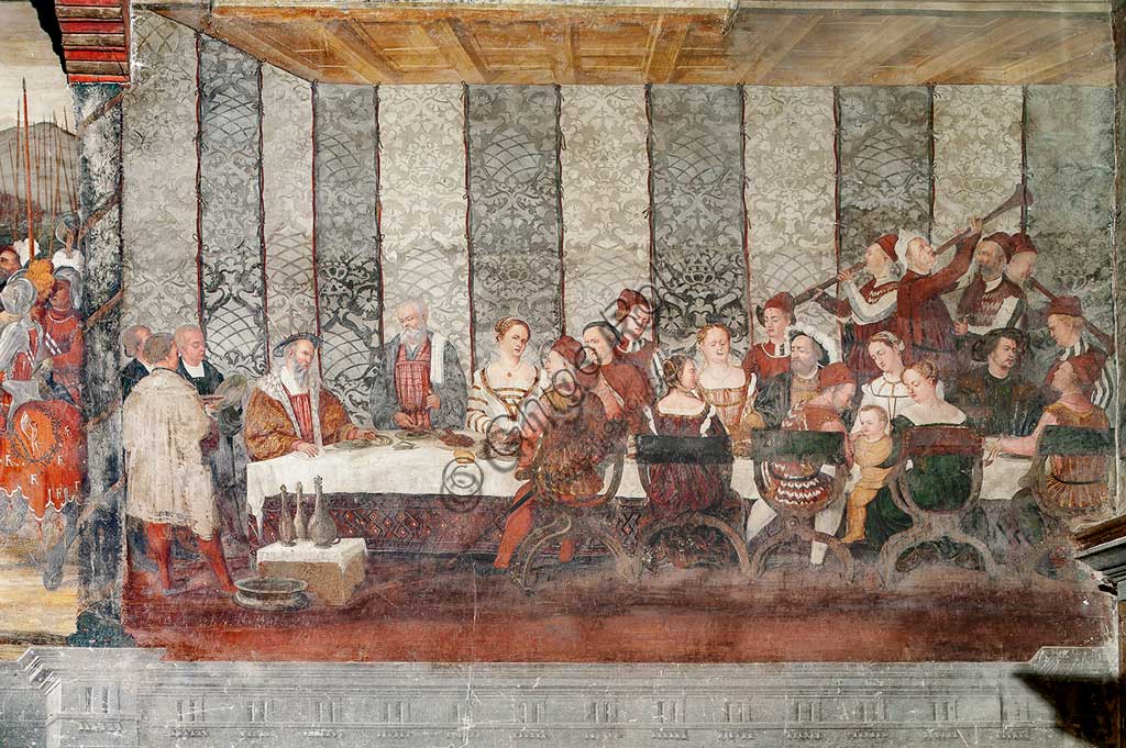 Cavernago, Malpaga Castle or Colleoni Castle, Hall of Honour: cycle of frescoes depicting the visit of Christian I of Denmark to Bartolomeo Colleoni, by Marcello Fogolino, (some historians attribute these frescoes to Romanino), 1474. Detail of the banquet.