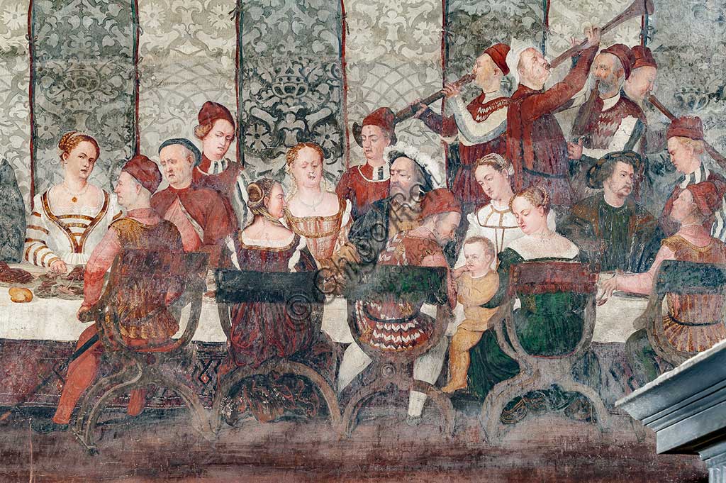 Cavernago, Malpaga Castle or Colleoni Castle, Hall of Honour: cycle of frescoes depicting the visit of Christian I of Denmark to Bartolomeo Colleoni, by Marcello Fogolino, (some historians attribute these frescoes to Romanino), 1474. Detail of the banquet.