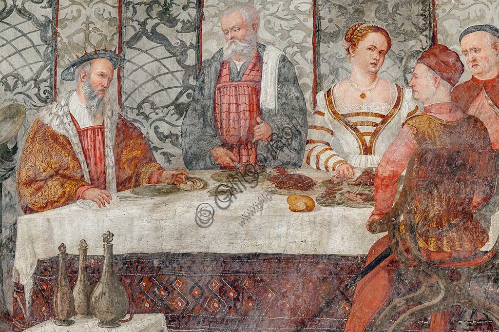 Cavernago, Malpaga Castle or Colleoni Castle, Hall of Honour: cycle of frescoes depicting the visit of Christian I of Denmark to Bartolomeo Colleoni, by Marcello Fogolino, (some historians attribute these frescoes to Romanino), 1474. Detail of the banquet.