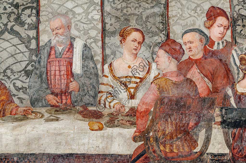 Cavernago, Malpaga Castle or Colleoni Castle, Hall of Honour: cycle of frescoes depicting the visit of Christian I of Denmark to Bartolomeo Colleoni, by Marcello Fogolino, (some historians attribute these frescoes to Romanino), 1474. Detail of the banquet.