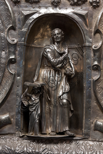   Genoa, Museum of the Treasury of the Cathedral of San Lorenzo: Antependium of altar called  "of Corpus Christi". Melchior Suez 1599, embossed and cast silver. The four evangelists are depicted inside the niches, in the ovals the martyrs  St. John the Baptist, St. Lawrence, St. Sebastian. Detail of the niche with St. Matthew.