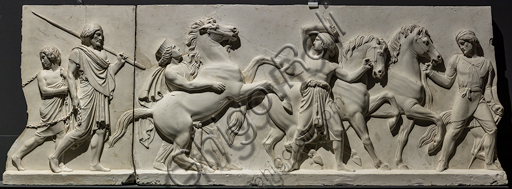  ""The entry of Alexander the Great into Babylon", a frieze executed between 1818 and 1828 by Bertel Thorvaldsen (1770 - 1844) in Carrara marble.  It is conceived as the meeting between two processions that converge towards the center, that is, towards the figure of Alexander the Great who advances on the chariot led by Victory, followed by his famous steed Bucefalo and his soldiers loaded with booty. In front of the leader, the allegorical figure of Peace, recognizable by the olive branch, precedes the people and the rulers of Babylon, who offer their gifts (horses, lions, panthers ...) to the winner, while dancers scatter flowers in his honor.Detail of the procession with men and a horse.