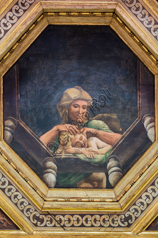 Mantova, Palazzo Te (residenza estiva dei Gonzaga), Camera delle Vittorie, dipinti su tavola di Agostino da Mozzanica (1528): dettaglio del soffitto a cassettoni con donna che spulcia un bambino.