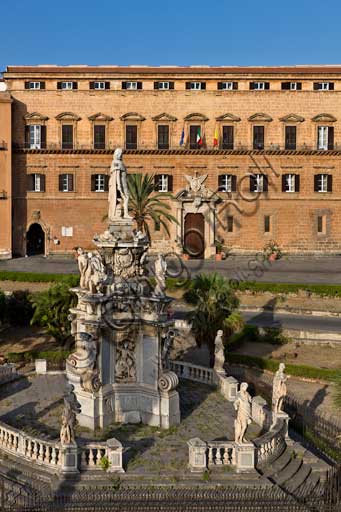 Palermo, The Royal Palace or Palazzo dei Normanni (Palace of the Normans), North-East side: view of the Renaissance wing and the Pisan Tower from Parliament Square. In the foreground, detail of the Marble Theatre, by Gaspare Guercio, Carlo D'Aprile and Gaspare Serpotta, realized to celebrate the glory of Philip IV of Habsburg, king of Spain and Sicily, called Philip the Great.