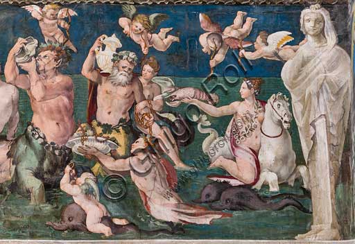 Rome, Villa Farnesina, The Hall of Perspectives: the ample frieze with mythological scenes inspired by the Ovid  Metamorphoses. Frescoes by Baldassarre Peruzzi and workshop (1517-18). Detail of "Triumph of Venus", marine scene with dolpnins and cupids. Venus is surrounded by nymphs and tritons, all paying tribute to the goddess of love, offering corals, shellfish and crustaceans.