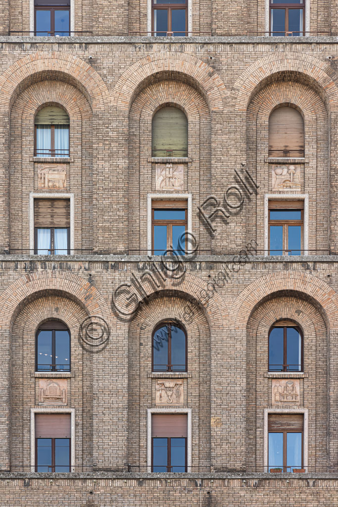 Brescia, piazza della Vittoria (square built between 1927 and 1932) designed by the architect and urban planner Marcello Piacentini: the Torrione Ina, the first skyscraper built in Italy (57.52 meters high). Detail of the façade.