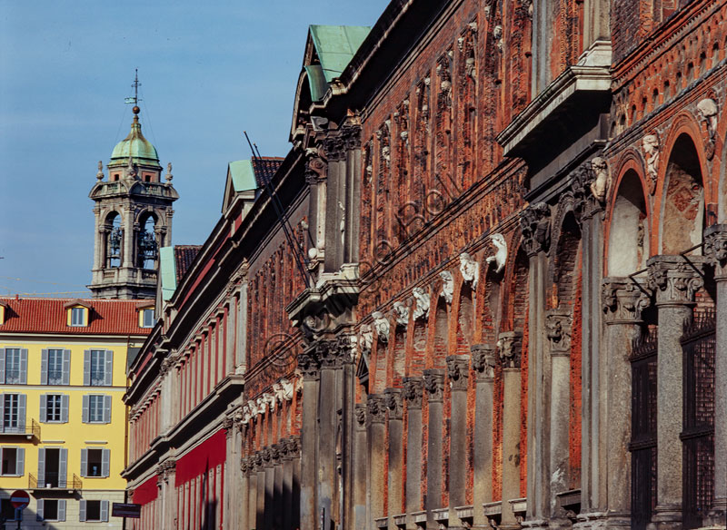  Ca' Granda, formerly Ospedale Maggiore: main entrance in Festa del Perdono street. Today it is the seat of the University of Studies of Milan. The Renaissance building was designed by Filarete. Detail of the facade, built in the 15th century, in terracotta, with round arches and rich decoration.