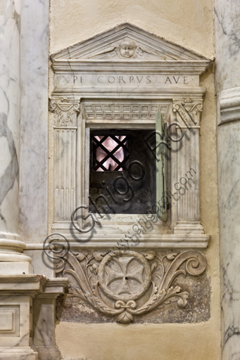 Genoa, Duomo (St. Lawrence Cathedral), inside, Baptistery (formerly Church of St. John the Old): detail of the window for the veneration of the urn of St. John's ashes.