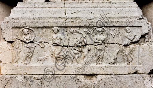 Reggio Emilia, Public Gardens or People Park, the Concordii monument (funeral monument found in Boretto. Roman art of the Imperial age, first century A. D.): detail of the central stele representing the four seasons.