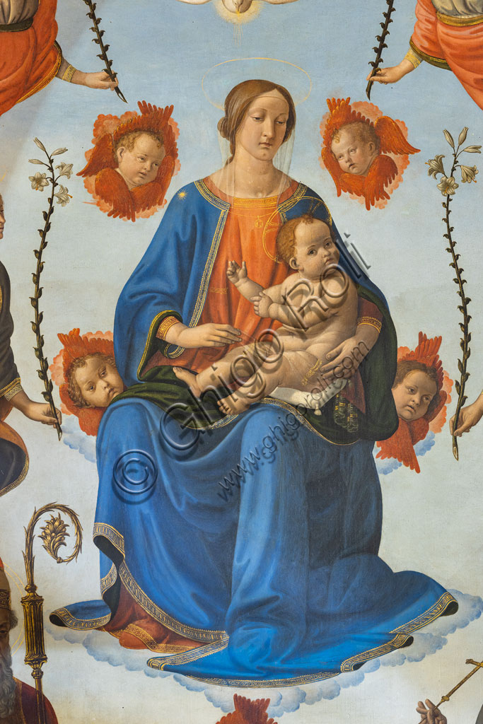 “Madonna con Bambino in gloria, sant'Ambrogio, san Francesco d'Assisi, Dio Padre e angeli”. Pala d’altare di Cosimo Rosselli, (1498-1501).Particolare della Vergine con il bambino.Firenze, Chiesa di S. Ambrogio.