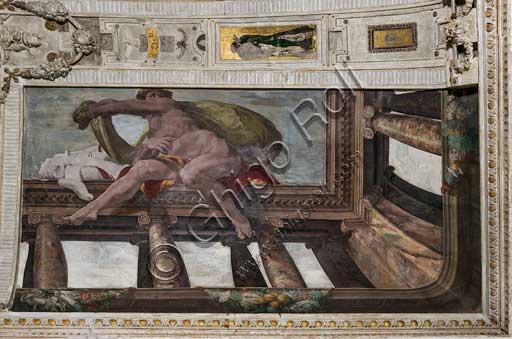  Bologna Palazzo Poggi, Room of Polyphemus: vault with episodes of the Odyssey. Detail of one out of the four figures of nudes in the corners of the ceiling.Frescoes by Pellegrino Tibaldi, 1550 - 1551