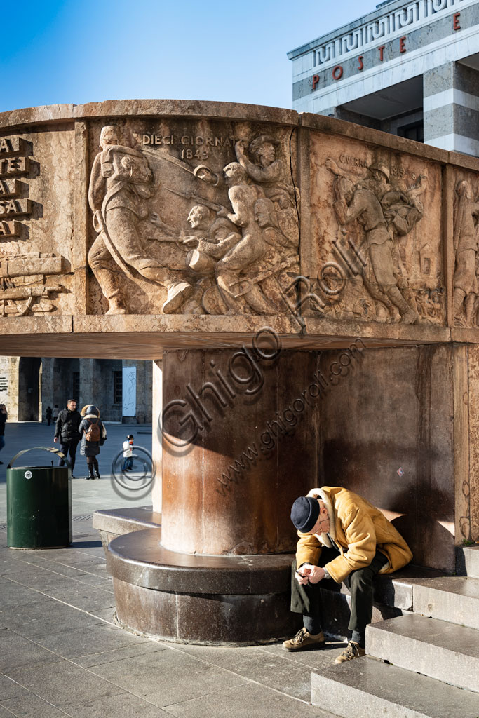 Brescia,piazza della Vittoria (square built between 1927 and 1932) designed by the architect and urban planner Marcello Piacentini: detail of  the Arengario, pulpit in red stone of Tolmezzo decorated with bas-reliefs depicting scenes of the history of Brescia, by Antonio Maraini (1932).