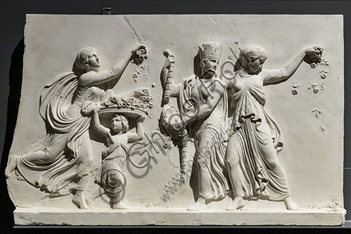  ""The entry of Alexander the Great into Babylon", a frieze executed between 1818 and 1828 by Bertel Thorvaldsen (1770 - 1844) in Carrara marble.  It is conceived as the meeting between two processions that converge towards the center, that is, towards the figure of Alexander the Great who advances on the chariot led by Victory, followed by his famous steed Bucefalo and his soldiers loaded with booty. In front of the leader, the allegorical figure of Peace, recognizable by the olive branch, precedes the people and the rulers of Babylon, who offer their gifts (horses, lions, panthers ...) to the winner, while dancers scatter flowers in his honor.Detail of the dancers scattering flowers.