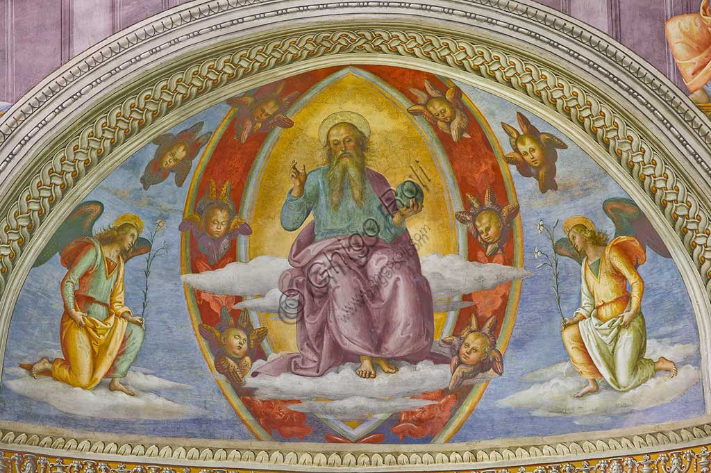 Montefalco, Museum of St. Francis, Church of St. Francis: "Nativity with the Annunciation and the Eternal among angels and cherubs", by Pietro Vannucci known as  Perugino, 1503. Fresco. Detail of  "The blessing Eternal between cherubs and two kneeling angels".