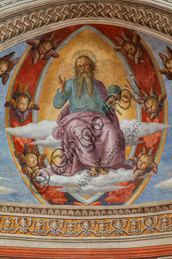 Montefalco, Complesso Museale di San Francesco, Chiesa di S. Francesco: "Natività con Annunciazione ed Eterno tra angeli e cherubini", di Pietro Vannucci detto il Perugino, 1503. Affresco. Particolare dell"Eterno in mandorla benedicente tra cherubini e due angeli inginocchiati".