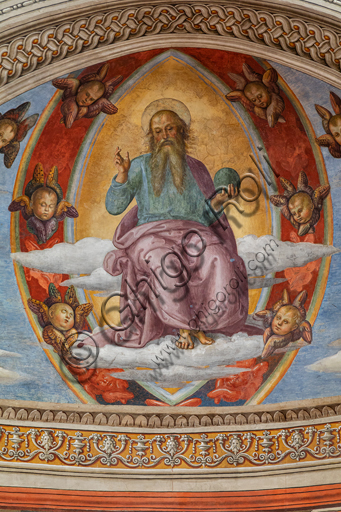 Montefalco, Museum of St. Francis. Church of St. Francis: "Nativity with the Annunciation and the Eternal among angels and cherubs", by Pietro Vannucci known as  Perugino, 1503. Fresco. Detail of  "The blessing Eternal in Vesica Piscis between cherubs".