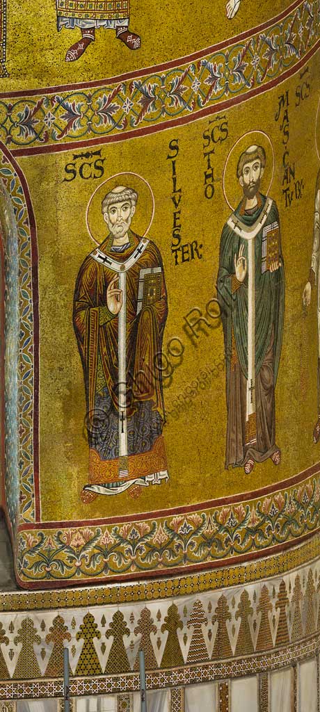  Monreale Cathedral, apse: St Silvester and St. Thomas of Canterbury, byzantine school mosaic with a golden background. The mosaics of the Cathedral were made between the twelfth and mid-thirteenth century by partly local and partly Venetian workers, trained at the Byzantine school.