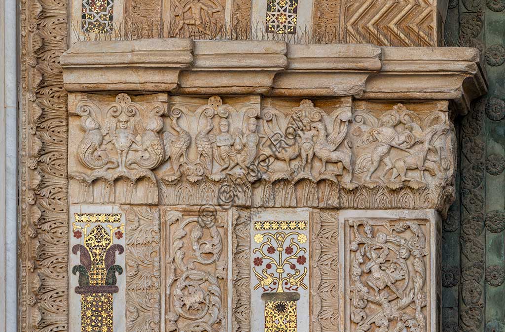  Cathedral of Monreale, main portal: detail with anthropomorphic figures and animals.