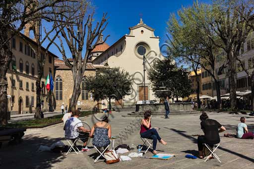   Florence, Piazza Santo Spirito: painting class. In the background, the Basilica of Santo Spirito.