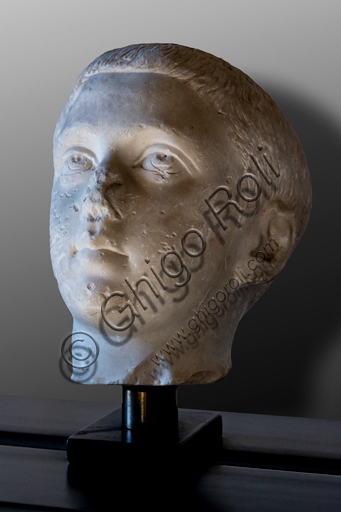  Foligno, Trinci Palace, Archaelogical Collection: one of the seven Roman heads that in the Middle Ages had been placed outside the painted Loggia to symbolize the Seven Ages of Man.  Portrait of Philip junior, or Childhood (III century a.C).