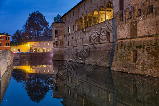 Fontanellato, Rocca Sanvitale: night view of the fortress and its moat.