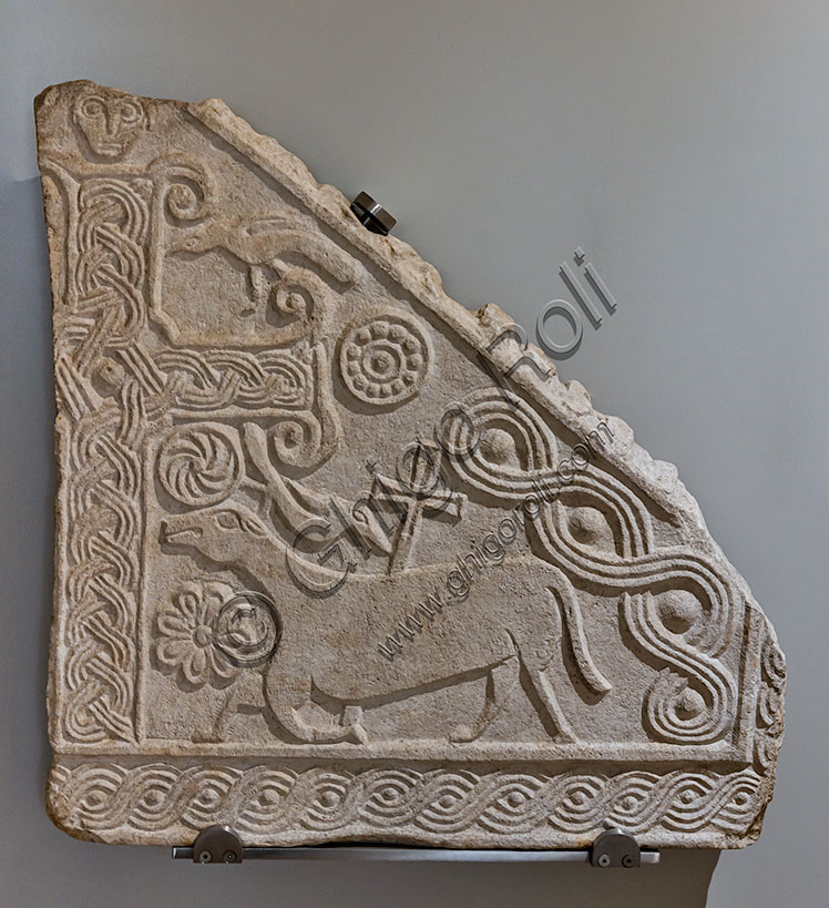 Fragment of tympanum with cross and cruciferous lamb, 9th century, Aurisina stone.