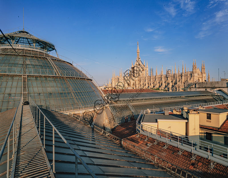  Vittorio Emanuele II Gallery, open in 1867: view of the nineteenth-century iron and glass roof. In the background, the Duomo.