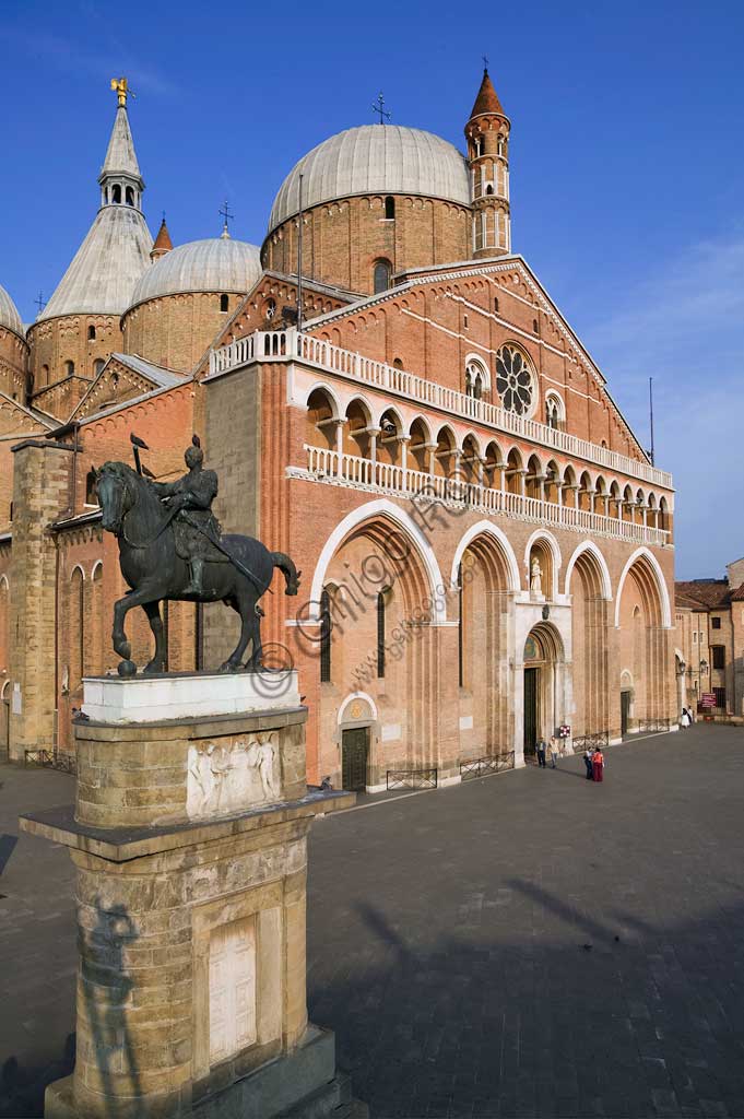   Padua, Piazza del Santo: view of the Basilica of St. Anthony or Basilica of the Saint. In the foreground, the equestrian statue representing Erasmo da Narni,  known as "Gattamelata", by Donatello (1453).