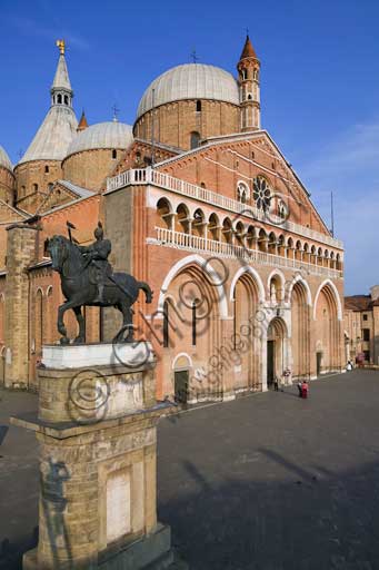   Padua, Piazza del Santo: view of the Basilica of St. Anthony or Basilica of the Saint. In the foreground, the equestrian statue representing Erasmo da Narni,  known as "Gattamelata", by Donatello (1453).