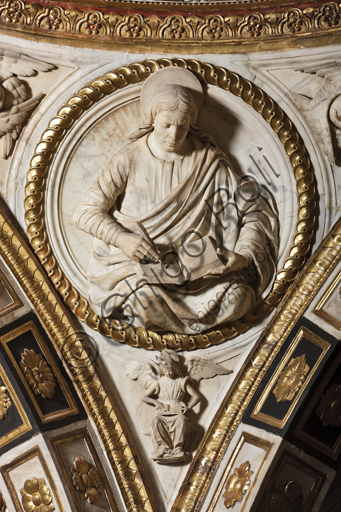 Genoa, Duomo (St. Lawrence Cathedral), the Chapel of St. John the Baptist: corbel of the dome with St. Matthew the Evangelist, marble bas-relief by Giovanni D'Aria (1483 - 1522).