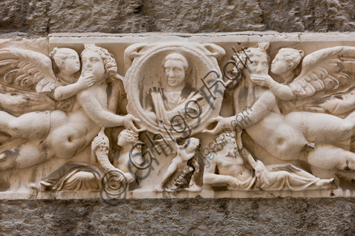 , Genoa, Duomo (St. Lawrence Cathedral, south side:front of sarcophagus with clypeus and pairs of Cupid and Psyche (about 240 a.D.). Detail.